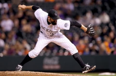 DENVER, CO – AUGUST 05: Pitcher Pat Neshek #37 of the Colorado Rockies throws in the ninth inning against the Philadelphia Phillies at Coors Field on August 5, 2017 in Denver, Colorado. (Photo by Matthew Stockman/Getty Images)