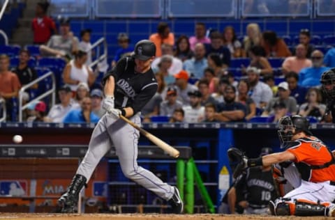 MIAMI, FL – AUGUST 13: Ryan McMahon #1 of the Colorado Rockies records his first major league hit in the eighth inning during the game between the Miami Marlins and the Colorado Rockies at Marlins Park on August 13, 2017 in Miami, Florida. (Photo by Mark Brown/Getty Images)