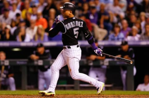 DENVER, CO – AUGUST 14: Carlos Gonzalez #5 of the Colorado Rockies watches his RBI single during the eighth inning against the Atlanta Braves at Coors Field on August 14, 2017 in Denver, Colorado. The Rockies defeated the Braves 3-0. (Photo by Justin Edmonds/Getty Images)