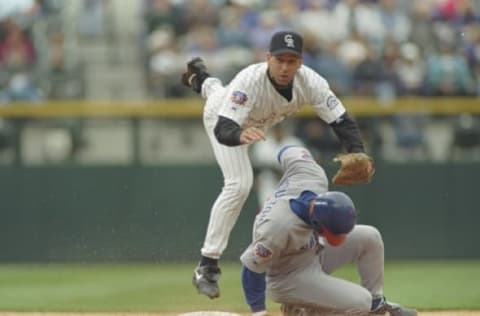 1 May 1997: Shortstop Walt Weiss of the Colorado Rockies tags out shortstop Shawon Dunston of the Chicago Cubs during a game at Coors Field in Denver, Colorado. The Rockies won the game 5-4. Mandatory Credit: Brian Bahr /Allsport