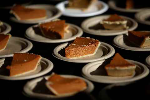 RICHMOND, CA – NOVEMBER 25: Slices of pumpkin pie sit on a table during the Great Thanksgiving Banquet hosted by the Bay Area Rescue Mission on November 25, 2015 in Richmond, California. Hundreds of homeless and needy people were given a free meal a day before Thanksgiving. (Photo by Justin Sullivan/Getty Images)