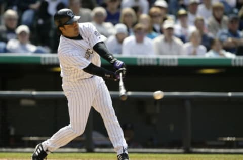 DENVER – MAY 1: Vinny Castilla #9 of the Colorado Rockies bats during the game against the Atlanta Braves in the first game of a double-header at Coors Field on May 1, 2004 in Denver, Colorado. The Rockies won 3-2. (Photo by Brian Bahr/Getty Images)