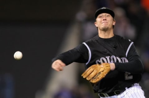 DENVER – OCTOBER 15: Infielder Troy Tulowitzki #2 of the Colorado Rockies fields a ground ball out against the Arizona Diamondbacks during Game Four of the National League Championship Series at Coors Field on October 15, 2007 in Denver, Colorado. (Photo by Harry How/Getty Images)