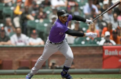 SAN FRANCISCO, CA – JUNE 28: Nolan Arenado #28 of the Colorado Rockies hits a two-run RBI single against the San Francisco Giants in the top of the first inning at AT&T Park on June 28, 2017 in San Francisco, California. (Photo by Thearon W. Henderson/Getty Images)