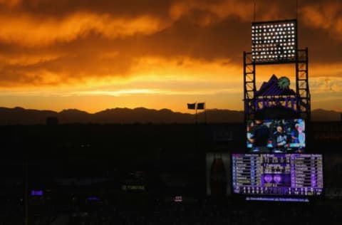 DENVER, CO – MAY 05: Sunset falls over the stadium as the Atlanta Braves face the Colorado Rockies at Coors Field on May 5, 2012 in Denver, Colorado. (Photo by Doug Pensinger/Getty Images)