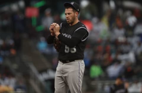 SAN FRANCISCO, CA – APRIL 16: Greg Holland #56 rubs the baseball during the ninth inning against the San Francisco Giants at AT&T Park on April 16, 2017 in San Francisco, California. The Rockies defeated the Giants 4-3. (Photo by Stephen Lam/Getty Images)