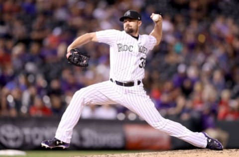 DENVER, CO – JUNE 06: Mike Dunn #38 of the Colorado Rockies throws in the ninth inning against the Cleveland Indians at Coors Field on June 6, 2017 in Denver, Colorado. (Photo by Matthew Stockman/Getty Images)