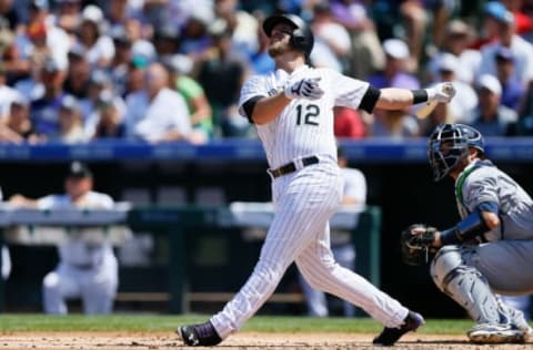 DENVER, CO – AUGUST 20: Mark Reynolds #12 of the Colorado Rockies watches his RBI sacrifice fly during the first inning against the Milwaukee Brewers at Coors Field on August 20, 2017 in Denver, Colorado. (Photo by Justin Edmonds/Getty Images)