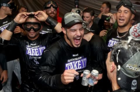 DENVER, CO – SEPTEMBER 30: Nolan Arenado #28 of the Colorado Rockies celebrates in the lockerroom at Coors Field on September 30, 2017 in Denver, Colorado. Although losing 5-3 to the Los Angeles Dodgers, the Rockies celebrated clinching a wild card spot in the post season. (Photo by Matthew Stockman/Getty Images)