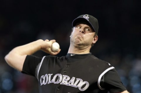 HOUSTON – SEPTEMBER 25: Pitcher Kevin Millwood #40 of the Colorado Rockies throws against the Houston Astros at Minute Maid Park on September 25, 2011 in Houston, Texas. (Photo by Bob Levey/Getty Images)