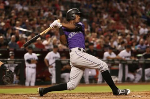 PHOENIX, AZ – JUNE 30: Raimel Tapia #7 of the Colorado Rockies breaks his bat as he hits a RBI on a ground ball out during the thirdi inning of the MLB game against the Arizona Diamondbacks at Chase Field on June 30, 2017 in Phoenix, Arizona. (Photo by Christian Petersen/Getty Images)