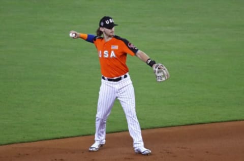 MIAMI, FL – JULY 09: Brendan Rodgers #1 of the Colorado Rockies and the U.S. Team fields the ball against the World Team during the SiriusXM All-Star Futures Game at Marlins Park on July 9, 2017 in Miami, Florida. (Photo by Rob Carr/Getty Images)