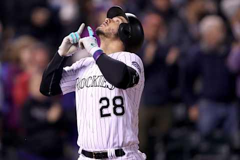 DENVER, CO – SEPTEMBER 26: Nolan Arenado #28 of the Colorado Rockies celebrates as he crosses home plater after hitting a 2 RBI home run in the sixth inning against the Miami Marlins at Coors Field on September 26, 2017 in Denver, Colorado. (Photo by Matthew Stockman/Getty Images)