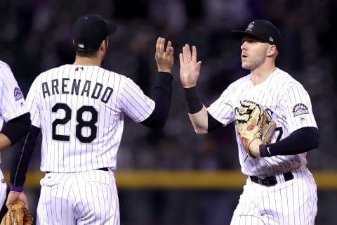 DENVER, CO – SEPTEMBER 26: Nolan Arenado # 28 and Trevor Story #27 of the Colorado Rockies celebrate their win against the Miami Marlins at Coors Field on September 26, 2017 in Denver, Colorado. (Photo by Matthew Stockman/Getty Images)