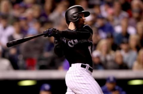 DENVER, CO – SEPTEMBER 29: Charlie Blackmon #19 of the Colorado Rockies hits a RBI single in the fifth inning against the Los Angeles Dodgers at Coors Field on September 29, 2017 in Denver, Colorado. (Photo by Matthew Stockman/Getty Images)