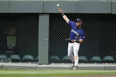 DENVER – MAY 25: Larry Walker #33 of the Colorado Rockies throws the ball in from the outfield during the game against the San Francisco Giants at Coors Field on May 25, 2003 in Denver, Colorado. The Rockies defeated the Giants 5-1. (Photo by Brian Bahr/Getty Images)