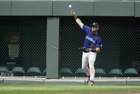 DENVER – MAY 25: Larry Walker #33 of the Colorado Rockies throws the ball in from the outfield during the game against the San Francisco Giants at Coors Field on May 25, 2003 in Denver, Colorado. The Rockies defeated the Giants 5-1. (Photo by Brian Bahr/Getty Images)