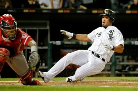 CHICAGO, IL – SEPTEMBER 27: Jose Abreu #79 of the Chicago White Sox beats the tag of Martin Maldonado #12 of the Los Angeles Angels of Anaheim to score on an RBI double by Nicky Delmonico #30 (not pictured) during the fourth inning at Guaranteed Rate Field on September 27, 2017 in Chicago, Illinois. (Photo by Jon Durr/Getty Images)