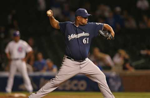 CHICAGO, IL – AUGUST 27: Livan Hernandez #61 of the Milwaukee Brewers pitches in the 9th inning against the Chicago Cubs at Wrigley Field on August 27, 2012 in Chicago, Illinois. The Brewers defeated the Cubs 15-4. (Photo by Jonathan Daniel/Getty Images)