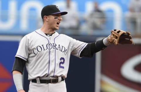 SAN DIEGO, CA – JULY 18: Troy Tulowitzki #2 of the Colorado Rockies yells after turning a double play during the first inning of a baseball game against the San Diego Padres at Petco Park July 18, 2015 in San Diego, California. (Photo by Denis Poroy/Getty Images)