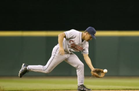 SEATTLE – JULY 15: Omar Vizquel#13 of the Cleveland Indians fields the ball during the game against the Seattle Mariners on July 15, 2004 at Safeco Field in Seattle, Washington. The Mariners defeated the Indians 2-1. (Photo by Otto Greule Jr/Getty Images)