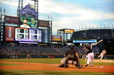 DENVER, CO – SEPTEMBER 7: David Dahl #26 of the Colorado Rockies hits a double in the first inning against the San Francisco Giants at Coors Field on September 7, 2016 in Denver, Colorado. (Photo by Bart Young/Getty Images)