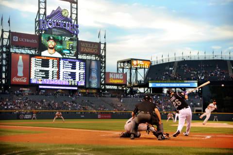 DENVER, CO – SEPTEMBER 7: David Dahl #26 of the Colorado Rockies hits a double in the first inning against the San Francisco Giants at Coors Field on September 7, 2016 in Denver, Colorado. (Photo by Bart Young/Getty Images)