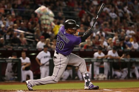 PHOENIX, AZ – JUNE 30: Ian Desmond #20 of the Colorado Rockies hits a single against the Arizona Diamondbacks during the first inning of the MLB game at Chase Field on June 30, 2017 in Phoenix, Arizona. (Photo by Christian Petersen/Getty Images)