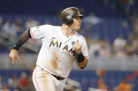 MIAMI, FL – SEPTEMBER 20: Justin Bour #41 of the Miami Marlins runs to first base after his hit against the New York Mets at Marlins Park on September 20, 2017 in Miami, Florida. (Photo by Joe Skipper/Getty Images)