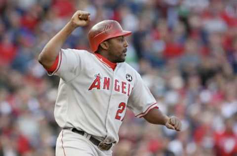 BOSTON – OCTOBER 11: Vladimir Guerrero #27 of the Los Angeles Angels of Anaheim reacts after hitting a two-run single in the ninth to take the lead against the Boston Red Sox in Game Three of the ALDS during the 2009 MLB Playoffs at Fenway Park on October 11, 2009 in Boston, Massachusetts. (Photo by Jim Rogash/Getty Images)