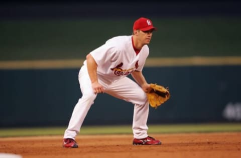 ST. LOUIS – JUNE 28: Scott Rolen #27 of the St. Louis Cardinals plays third base during the game against the Cincinnati Reds on June 28, 2005 at Busch Stadium in St. Louis, Missouri. (Photo by Elsa/Getty Images).