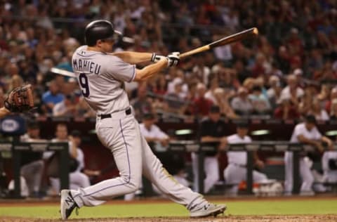 PHOENIX, AZ – SEPTEMBER 12: DJ LeMahieu #9 of the Colorado Rockies hits a single against the Arizona Diamondbacks during the seventh inning of the MLB game at Chase Field on September 12, 2017 in Phoenix, Arizona. (Photo by Christian Petersen/Getty Images)