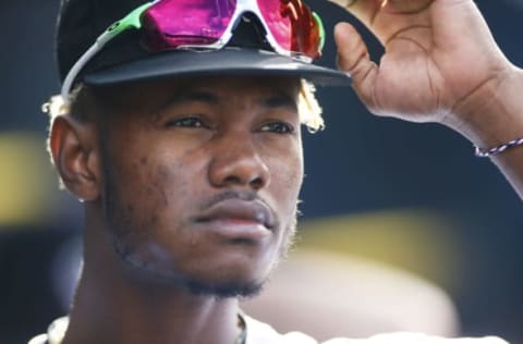 DENVER, CO – OCTOBER 01: Raimel Tapia #7 of the Colorado Rockies stands in the dugout during a regular season MLB game between the Colorado Rockies and the visiting Los Angeles Dodgers at Coors Field on October 1, 2017 in Denver, Colorado. (Photo by Russell Lansford/Getty Images)