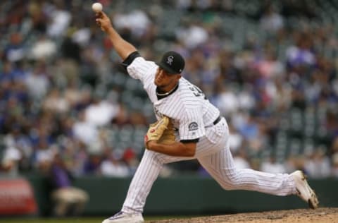 DENVER, CO – OCTOBER 01: Carlos Estevez #54 of the Colorado Rockies pitches during a regular season MLB game between the Colorado Rockies and the visiting Los Angeles Dodgers at Coors Field on October 1, 2017 in Denver, Colorado. (Photo by Russell Lansford/Getty Images)