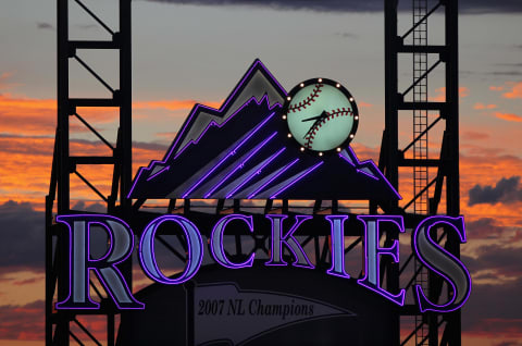 DENVER, CO – JULY 14: The sun sets over the stadium behind the scoreboard as the Milwaukee Brewers face the Colorado Rockies at Coors Field on July 14, 2011 in Denver, Colorado. The Rockies defeated the Brewers 12-3. (Photo by Doug Pensinger/Getty Images)