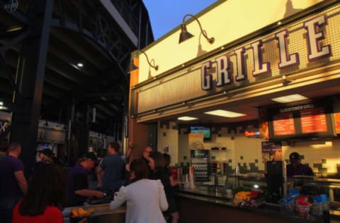 DENVER, CO – MAY 05: Fans visit the grille on the upper concourse of the stadium as sun sets while the Atlanta Braves defeat the Colorado Rockies 13-9 at Coors Field on May 5, 2012 in Denver, Colorado. (Photo by Doug Pensinger/Getty Images)