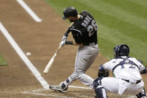 MILWAUKEE, WI – AUGUST 23: David Dahl #26 of the Colorado Rockies hits a single during the third inning against the Milwaukee Brewers at Miller Park on August 23, 2016 in Milwaukee, Wisconsin. (Photo by Mike McGinnis/Getty Images)