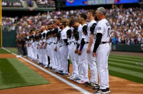 DENVER, CO – APRIL 7: Manager Bud Black of the Colorado Rockies stands on the first base line with rest of the team as the National Anthem plays before taking on the Los Angeles Dodgers on Opening Day at Coors Field on April 7, 2017 in Denver, Colorado. The Rockies defeated the Dodgers 2-1. (Photo by Justin Edmonds/Getty Images)