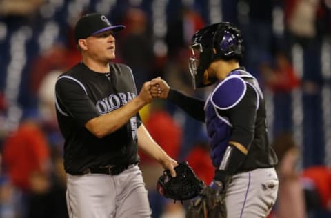 PHILADELPHIA, PA – MAY 24: Pitcher Jake McGee #51 of the Colorado Rockies is congratulated by catcher Tony Wolters #14 after getting the final out and defeating the Philadelphia Phillies 7-2 during a game at Citizens Bank Park on May 24, 2017 in Philadelphia, Pennsylvania. (Photo by Rich Schultz/Getty Images)