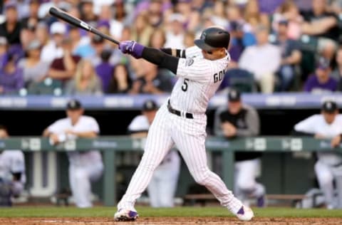 DENVER, CO – JUNE 06: Carlos Gonzalez #5 of the Colorado Rockies hits a 2 RBI home run in the third inning against the Cleveland Indians at Coors Field on June 6, 2017 in Denver, Colorado. (Photo by Matthew Stockman/Getty Images)