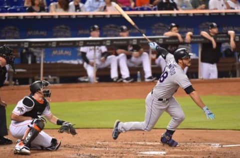 MIAMI, FL – AUGUST 11: Nolan Arenado #28 of the Colorado Rockies hits a two-run home run in the third inning against the Miami Marlins at Marlins Park on August 11, 2017 in Miami, Florida. (Photo by Eric Espada/Getty Images)