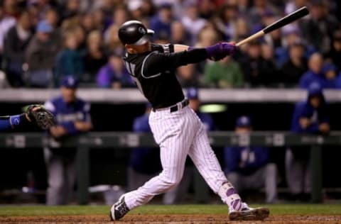 DENVER, CO – SEPTEMBER 29: Trevor Story #27 of the Colorado Rockies hits a 2 RBI home run in the fourth inning against the Los Angeles Dodgers at Coors Field on September 29, 2017 in Denver, Colorado. (Photo by Matthew Stockman/Getty Images)