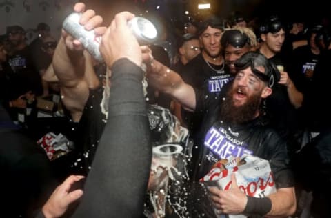 DENVER, CO – SEPTEMBER 30: Charlie Blackmon #19 of the Colorado Rockies celebrates in the lockerroom at Coors Field on September 30, 2017 in Denver, Colorado. Although losing 5-3 to the Los Angeles Dodgers, the Rockies celebrated clinching a wild card spot in the post season. (Photo by Matthew Stockman/Getty Images)