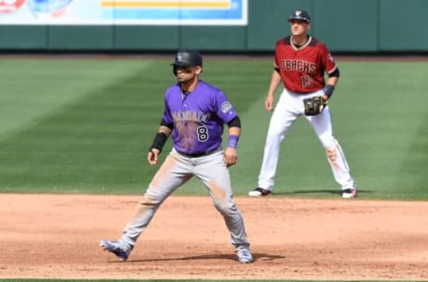 SCOTTSDALE, AZ – MARCH 12: Gerardo Parra #8 of the Colorado Rockies takes a lead from second base as Nick Ahmed #13 of the Arizona Diamondbacks gets ready to make a play during the fifth inning of a spring training game at Salt River Fields at Talking Stick on March 12, 2018 in Scottsdale, Arizona. (Photo by Norm Hall/Getty Images)