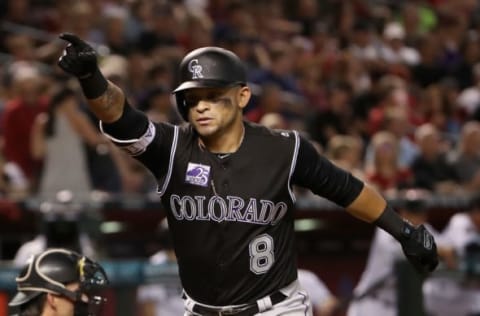 PHOENIX, AZ – MARCH 30: Gerardo Parra #8 of the Colorado Rockies celebrates after hitting a two-run home run against the Arizona Diamondbacks during the fourth inning of the MLB game at Chase Field on March 30, 2018 in Phoenix, Arizona. (Photo by Christian Petersen/Getty Images)