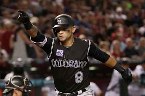 PHOENIX, AZ – MARCH 30: Gerardo Parra #8 of the Colorado Rockies celebrates after hitting a two-run home run against the Arizona Diamondbacks during the fourth inning of the MLB game at Chase Field on March 30, 2018 in Phoenix, Arizona. (Photo by Christian Petersen/Getty Images)