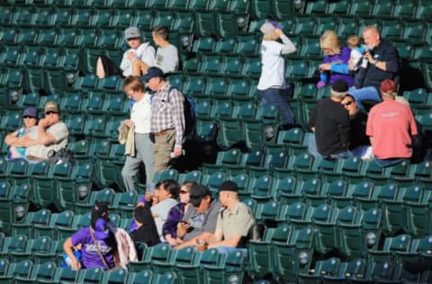 DENVER, CO – MAY 30: Fans enter the stadium and take the seats as the Houston Astros face the Colorado Rockies during Interleague play at Coors Field on May 30, 2013 in Denver, Colorado. The Astros defeated the Rockies 7-5. (Photo by Doug Pensinger/Getty Images)