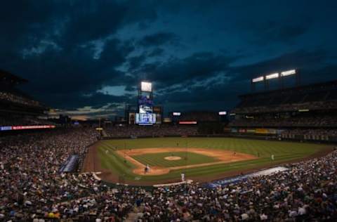 DENVER, CO – JUNE 6: A general view of Coors Field as the sun setts from the press box during a game between the Colorado Rockies and the San Diego Padres at Coors Field on June 6, 2013 in Denver, Colorado. The Padres beat the Rockies 6-5 in 12 innings. (Photo by Dustin Bradford/Getty Images)