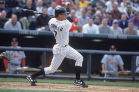 5 Apr 2001: Jeff Cirillo #7 of the Colorado Rockies swings at the pitch during the game against the St. Louis Cardinals at Coors Field in Denver, Colorado. The Rockies defeated the Cardinals 11-2.Mandatory Credit: Brian Bahr/Allsport