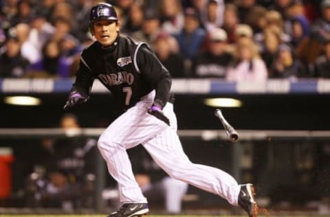 DENVER – OCTOBER 27: Kazuo Matsui #7 of the Colorado Rockies throws his bat on a bunt single in the bottom of the seventh inning against the Boston Red Sox during Game Three of the 2007 Major League Baseball World Series at Coors Field on October 27, 2007 in Denver, Colorado. (Photo by Stephen Dunn/Getty Images)